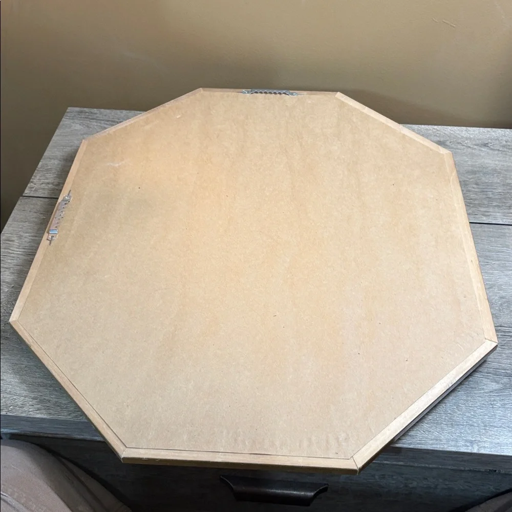 A mid century modern style octagonal mirror vertical or horizontal orientation